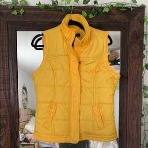 yellow puffer vest